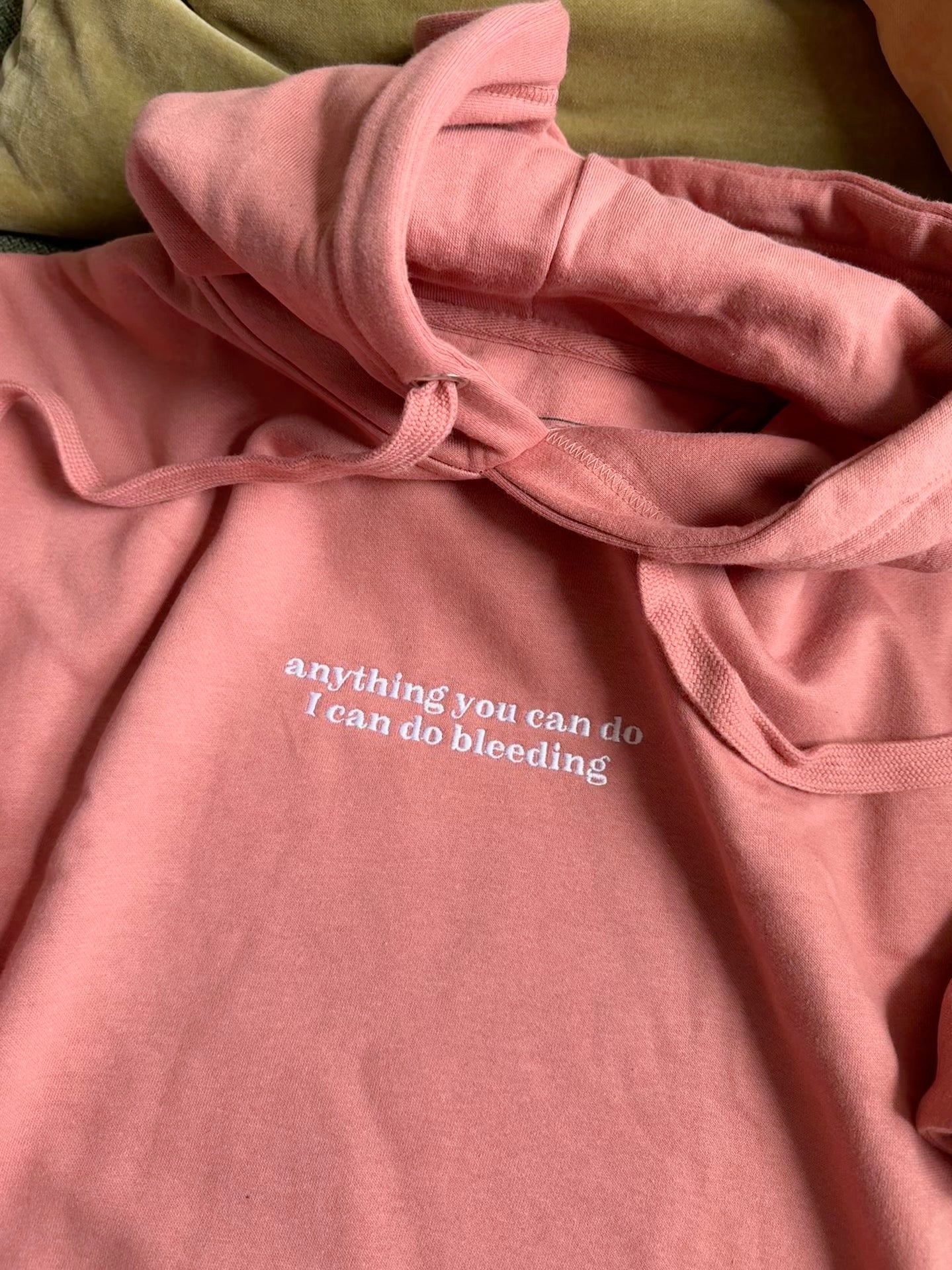 Embroidered "Anything You Can Do I Can Do Bleeding" Classic Cozy Hoodie